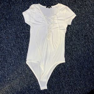 Criss-cross body suit